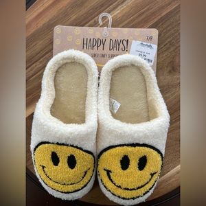 Brand new, never worn smiley face slippers